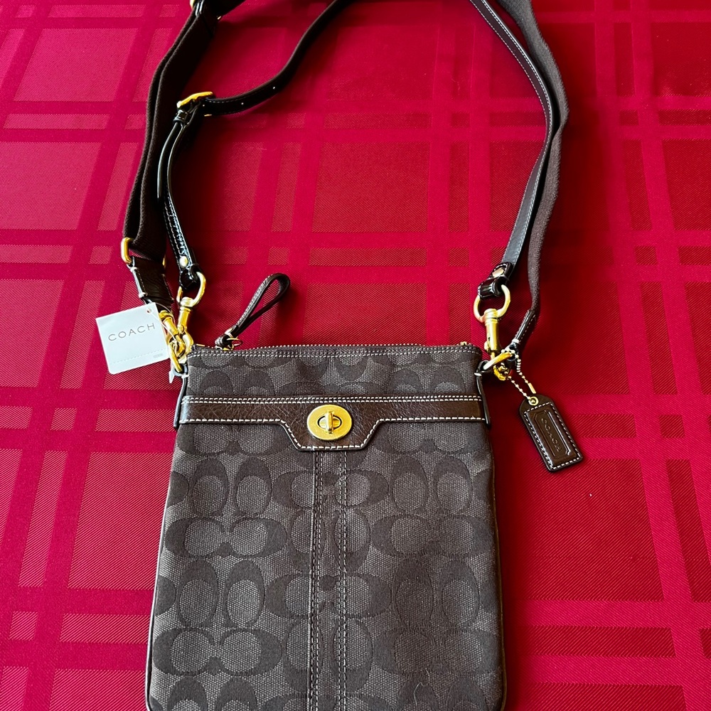 Coach Signature series crossbody.
